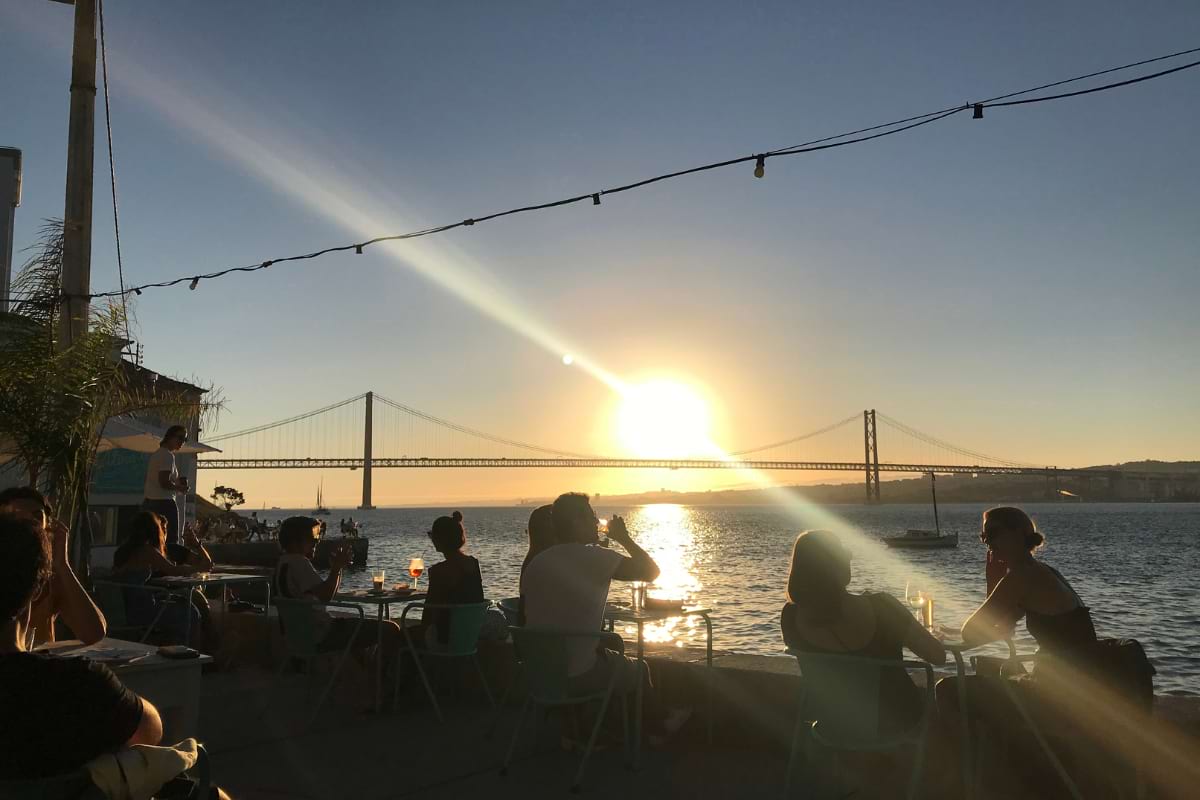 View and sunset from the Cacilhas riverfront looking back to Lisbon