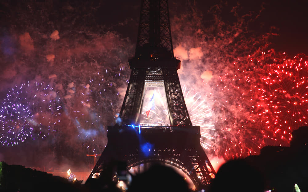 Bastille Day Fireworks in Paris - Festivals in France © Image Courtesy of Sergii Rudiuk from Getty Images by Canva